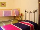 фото отеля Al Son de los Santos . Hostal Artesanal