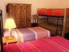 фото отеля Al Son de los Santos . Hostal Artesanal