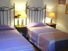 фото отеля Al Son de los Santos . Hostal Artesanal