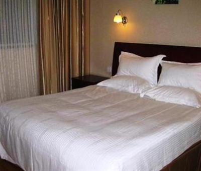 фото отеля Green Tree Inn Chain Zaozhuang Guicheng Express