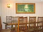 фото отеля The Cottage Restaurant and Red Carpet Inn and Suites
