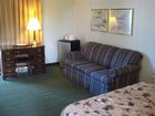 фото отеля The Cottage Restaurant and Red Carpet Inn and Suites