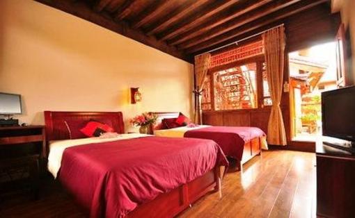 фото отеля Lijiang Doujin Inn