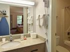 фото отеля Travelers Inn and Suites Forest City