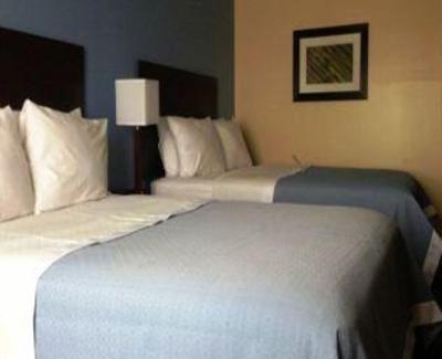 фото отеля Days Inn & Suites Ozone Park JFK Airport