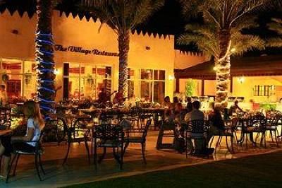 фото отеля Al Hamra Village Golf Resort