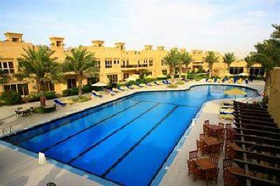 фото отеля Al Hamra Village Golf Resort