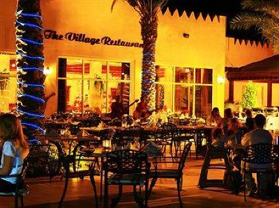 фото отеля Al Hamra Village Golf Resort
