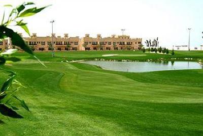 фото отеля Al Hamra Village Golf Resort