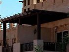 фото отеля Al Hamra Village Golf Resort