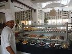 фото отеля Al Hamra Village Golf Resort