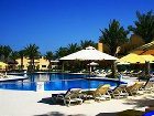 фото отеля Al Hamra Village Golf Resort
