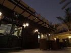 фото отеля Al Hamra Village Golf Resort