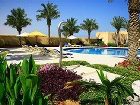 фото отеля Al Hamra Village Golf Resort