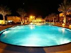 фото отеля Al Hamra Village Golf Resort