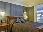 фото отеля Americas Best Value Inn & Suites - Royal Carriage