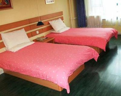 фото отеля Home Inns Development Zone Wuyishan Road Qingdao