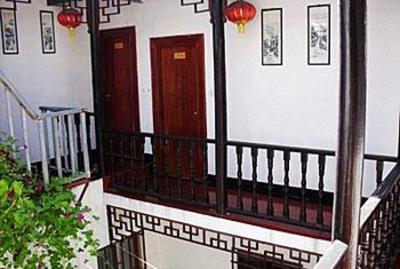 фото отеля Zhouzhuang Xinsheng Inn