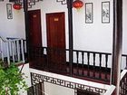 фото отеля Zhouzhuang Xinsheng Inn