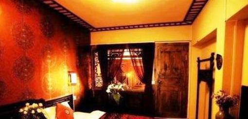 фото отеля Lijiang Happiness Inn
