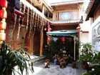 фото отеля Lijiang Happiness Inn