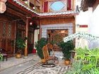 фото отеля Lijiang Happiness Inn