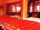 фото отеля Lijiang Happiness Inn