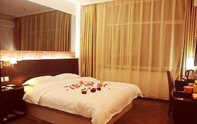 фото отеля Juzi Hongle Hotel Qiqihar Longnan Street