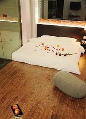 фото отеля Juzi Hongle Hotel Qiqihar Longnan Street
