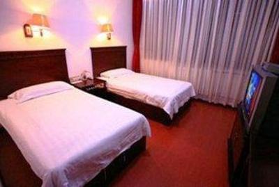 фото отеля Qingdao Xue Yuan Hotel