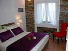 фото отеля Andros Prive Suites