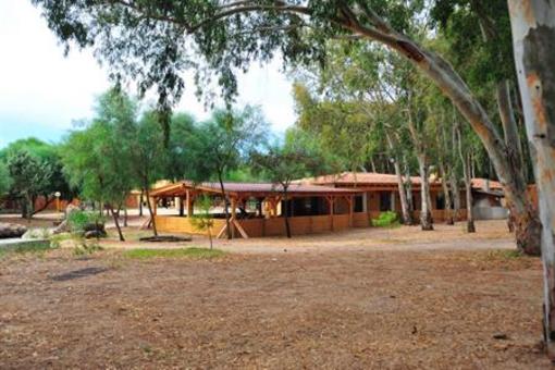 фото отеля Is Arenas Camping Village
