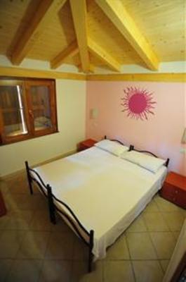 фото отеля Is Arenas Camping Village