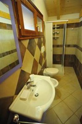 фото отеля Is Arenas Camping Village