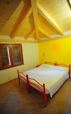 фото отеля Is Arenas Camping Village