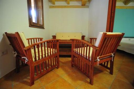 фото отеля Is Arenas Camping Village
