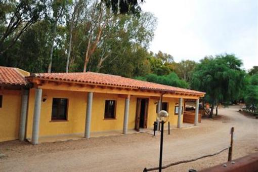 фото отеля Is Arenas Camping Village