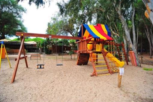 фото отеля Is Arenas Camping Village