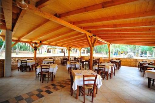 фото отеля Is Arenas Camping Village