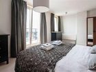 фото отеля Dapper Market Apartment Suites