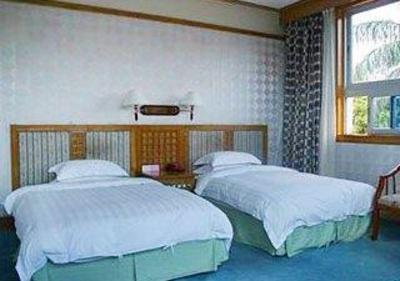 фото отеля Yinhai Holiday Hotel Qionghai