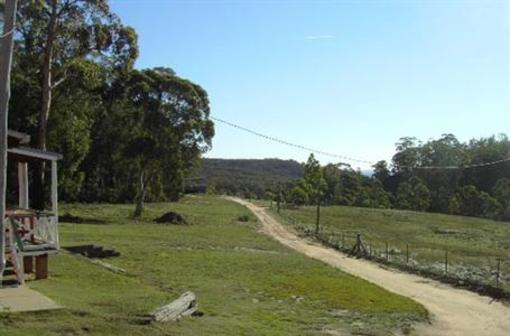 фото отеля Wombat Hilltop Cottages