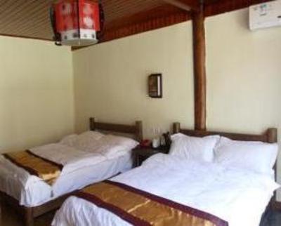 фото отеля Lijiang Shuhe Tianyijiao Inn