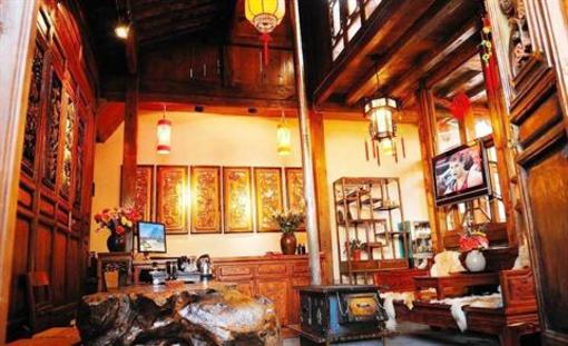 фото отеля Lijiang Homeland Inn Courtyard 1