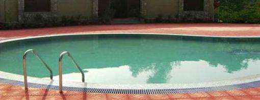 фото отеля Corbett Tiger Den Resort Ramnagar