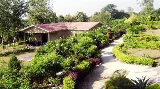 фото отеля Corbett Tiger Den Resort Ramnagar