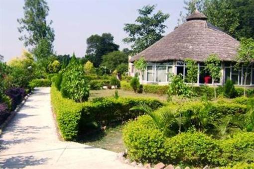 фото отеля Corbett Tiger Den Resort Ramnagar