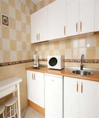 фото отеля Apartamentos Niña De Oro 21