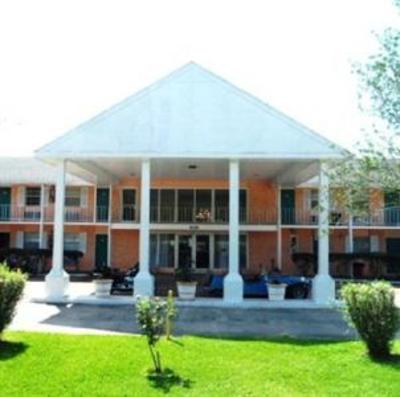 фото отеля Houma S Red Carpet Inn
