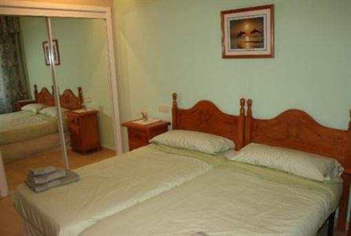 фото отеля Hacienda Beach Apartments